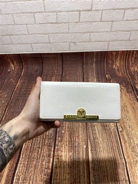 versace handles|Versace leather wallet.